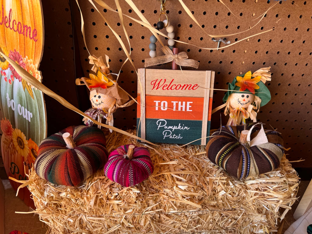 Decorative textile pumpkins in seasonal colors
